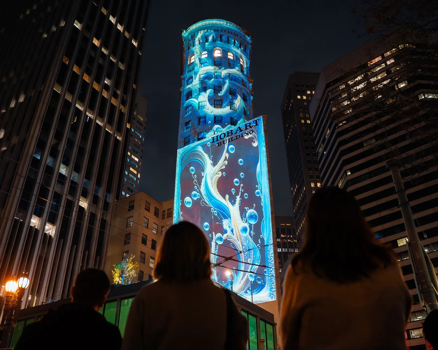 Let's Glow light projection on the Hobart Building, San Francisco